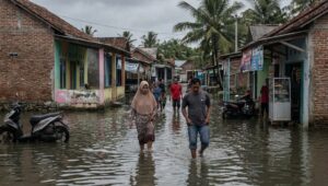Ilustrasi banjir rob menggenangi pemukiman pesisir